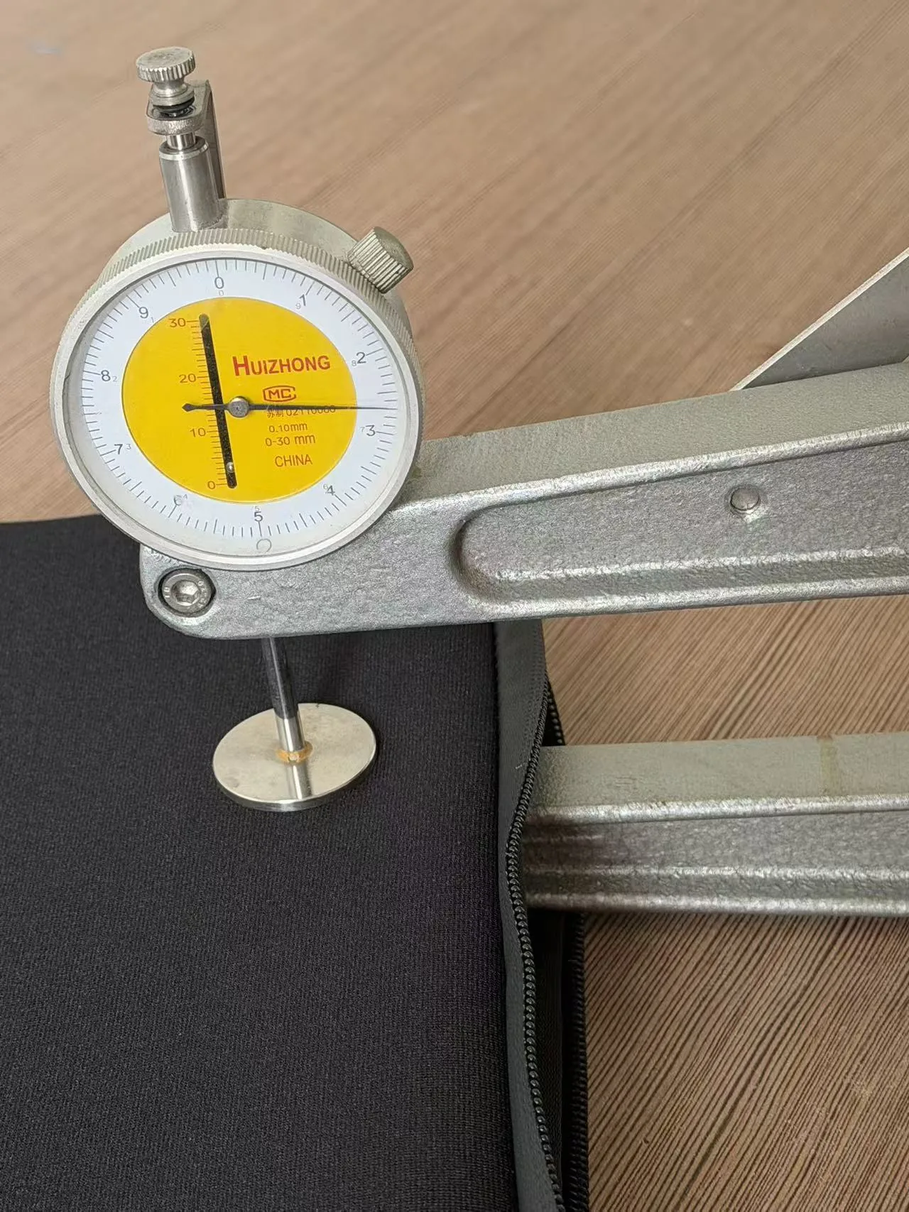 Thickness check for neoprene material and sample review