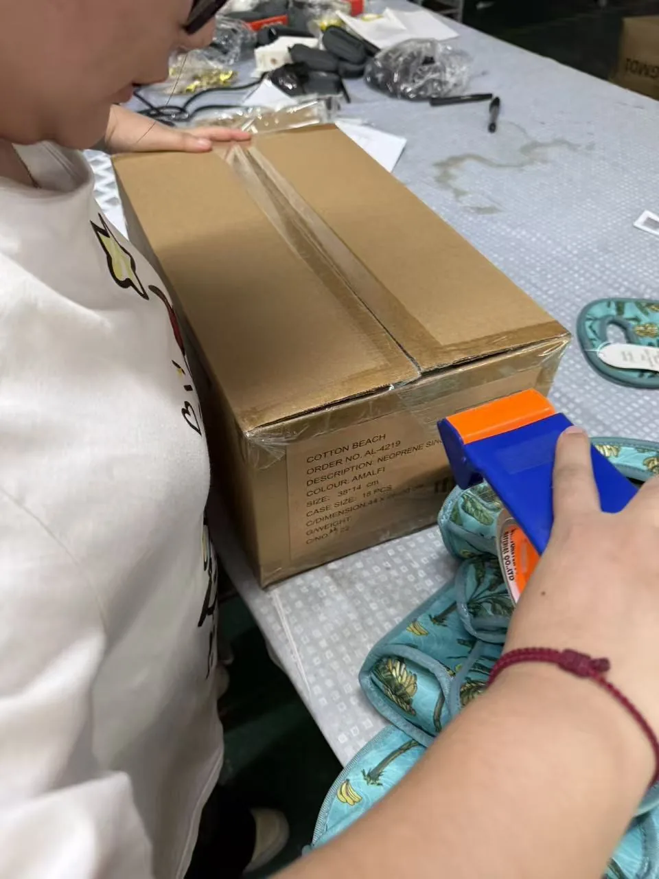 Carton packing process for neoprene products