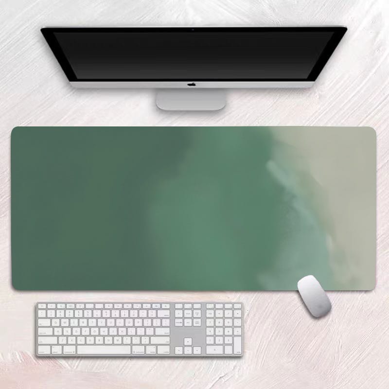 Large printed desk mat shown with keyboard and mouse for scale